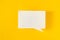 Symbol sign message from a white paper on a yellow background, social network, message