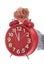 Symbol of time : hand holding red clock , eleventh hour isolated