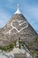 Symbol in the Trullo conical rooftop in Alberobello, Apulia, Italy