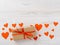 Symbol of Valentine`s day - gift box in kraft brown paper with r
