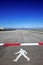 Symbol of walking man on runway at Gibraltar airport