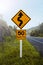 Symbol warning of the road,