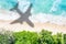 Symbolic picture vacation travel traveling sea airplane flying Seychelles beach