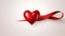 A symbolic red ribbon depicting a heart. AI generated