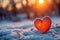 Symbolic winter love red heart in snowy twilight setting