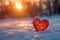 Symbolic winter love red heart in snowy twilight setting