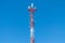 symbolizing the modern way of messaging and communication. the receiving antenna of the TV signal. blue sky background. steel