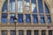 Symbols of the city on the facade of Gare du Nord