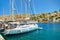 SYMI ISLAND, GREECE, JUNE,25, 2013: View on beautiful classic white yachts, Greek sea port, gingerbread houses on island hills, to