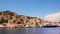 Symi town, Symi island, pictorial view of colorful houses and Yialos harbour