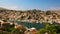 Symi town, Symi island, pictorial view of colorful houses and Yialos harbour