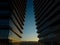 Symmetric aerial view of modern buildings at a soft sunrise