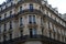 Symmetric architecture and tiny long balconies in Paris