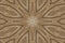 Symmetric uniquelly carved ornament on wood digitally generated