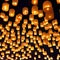 A symmetrical arrangement of floating lanterns, casting a warm and inviting glow in the night sky4, Generative AI