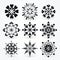 Symmetrical Black And White Snowflake Icons - Vector Art