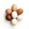 Symmetrical Brown And White Eggs On White Background