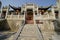 Symmetrical chinese ancient stone decorated archway in Henan, China.