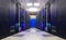 Symmetrical futuristic modern server room in the data center with