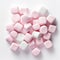 Symmetrical Pink And White Marshmallows On White Background