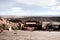 Symmetrical shot of RedRocks Amphitheater on a Beautiful Sunny Skies Day with Surrounding Mountain Landscape Background