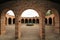 Symmetrical View of Circular Courtyard, Looking Through Brick Arches