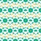 Symmetrical vintage pattern with green flowers. Stylized floral drawing in the style of the 70s.