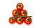 Symmetrically positioned tomatoe ripe on a white background
