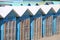 Symmetry: Closed beach huts on the famous Lido beach in Venice, Italy.