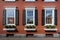 symmetry of windows in a colonial brick house