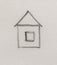 Symple symbolic drawing of a house, pencil drawing on paper.