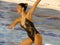 Synchronized swimmer girl in tournament