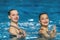 Synchronized swimming as a dynamic duet brings fluid artistry to the pool, graceful movements and synchronized precision captivate