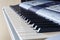 A synthesizer or electronic piano keys. Musical education for kid in music school