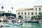 Syracuse, Sicily, Italy â€“ august 12, 2018: sail boats and pleasure boats in old port, seafront of Ortygia Ortigia Island