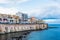Syracuse, Sicily, Italy â€“ August 23, 2018 : Panoramic view of the Ortigia waterfront in Syracuse with the blue sky background