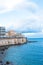 Syracuse, Sicily, Italy â€“ August 23, 2018 : Panoramic view of the Ortigia waterfront in Syracuse with the blue sky background