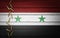 Syria flag with bullets on wooden background