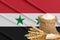 Syria grain crisis, Concept global hunger crisis,  On background Flag Syria wheat grain. Concept of growing wheat in Syria