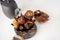 Syrian sweets are served on the table. A mixture of Arabic sweets and dates of hastac. Dried fruit rolls stuffed with walnuts