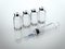 Syringe with five bottles of vaccine. 3d rendering