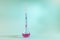 A syringe inside of a test tube. Experiment, medicine and science concept