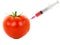 Syringe stuck in a red tomato