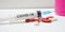 Syringe and tablets of various color antivirus protection