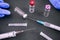 Syringes, gloves and empty vaccine vials