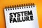 System Failure text quote on notepad, concept background