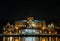 Szczecin. Night view from across the river to the illuminated historic center. Odra river. Chrobry embankments in Szczecin