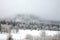 Szczeliniec Great in the clouds. Winter in Table Mountain National Park, Poland.