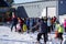 Szczyrk, Poland 15.01.2020: Crowds skiers and snowboarders in a Queue for a comfortable modern chair lift in a mountain resort in