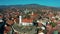 Szentendre, Hungary - 4K flying above downtown of Szentendre towards Saint John the Baptist`s Parish Church